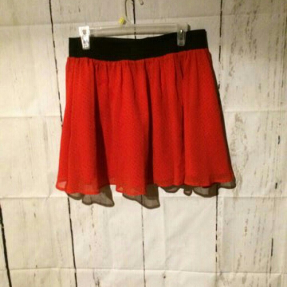 Red with black pokadots and black elastic waist
